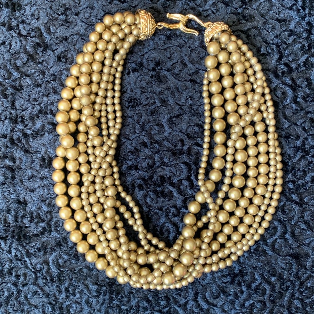 Vintage Richelieu 8 multi-strand gold tone faux pearl necklace with chunky clasp